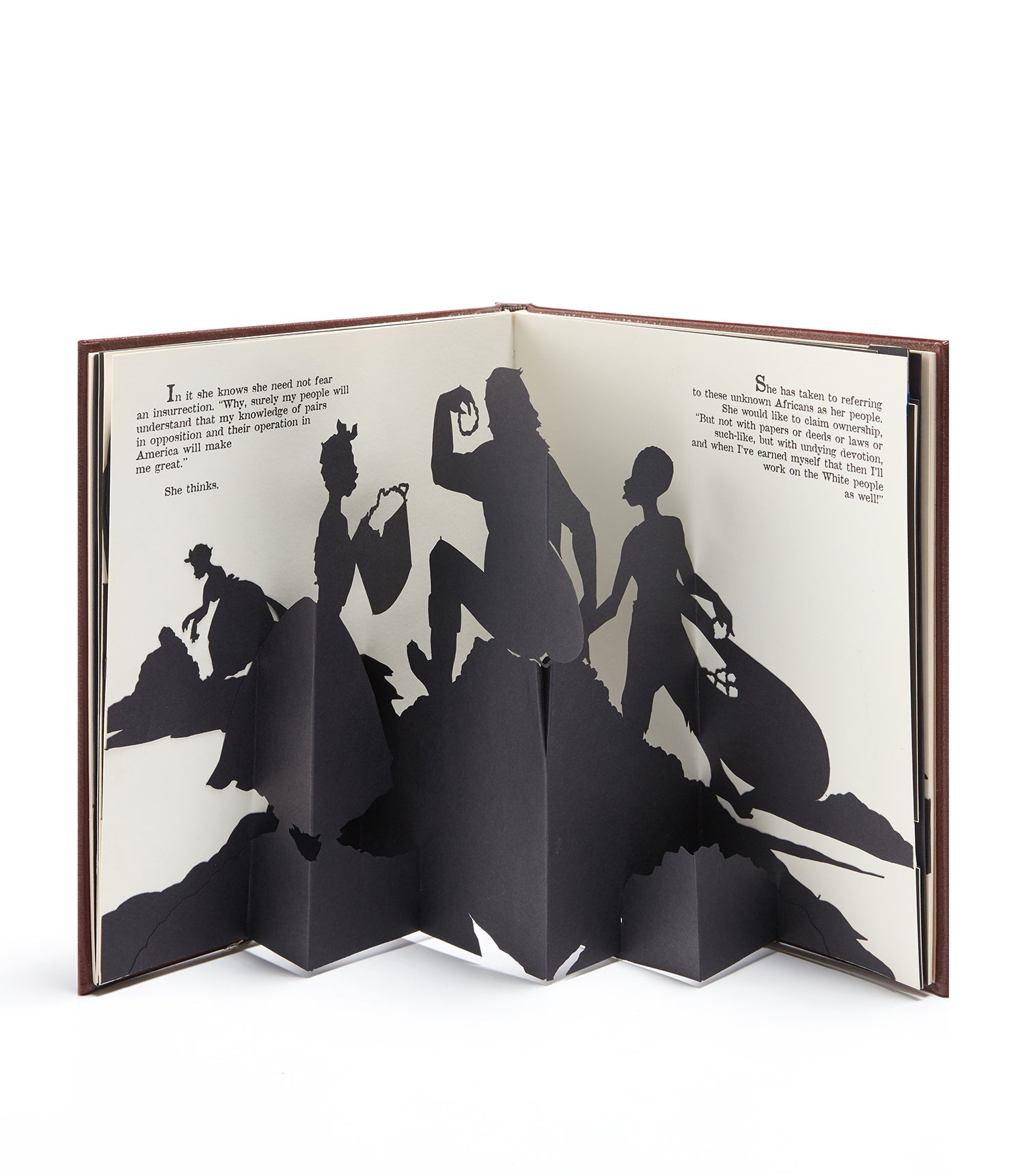 Open pages from 3D popup book by Kara Walker.
